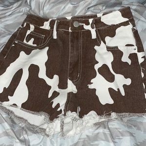 womens brown cow-print jean shorts from shein
